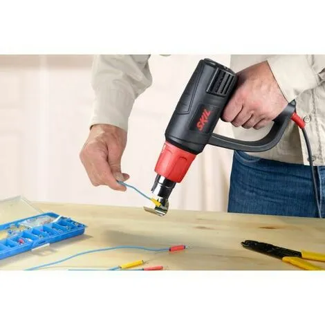 Skil Decapeur Thermique 8004 AA, Pistolet Air Chaud 2000 W, Avec Buses + Mallette 4 Skil Decapeur Thermique 8004 AA, Pistolet Air Chaud 2000 W, Avec Buses + Mallette – Image 4